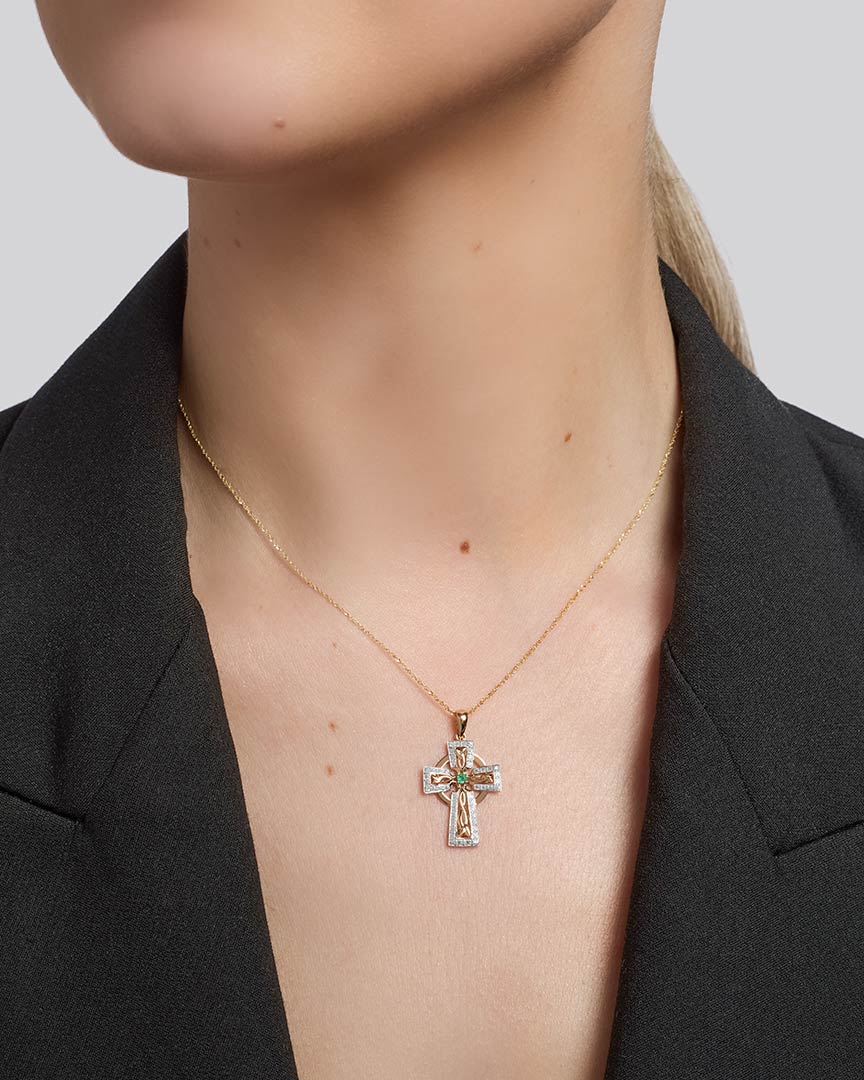 14k gold diamond and emerald cross necklace s46103 from Solvar on a model