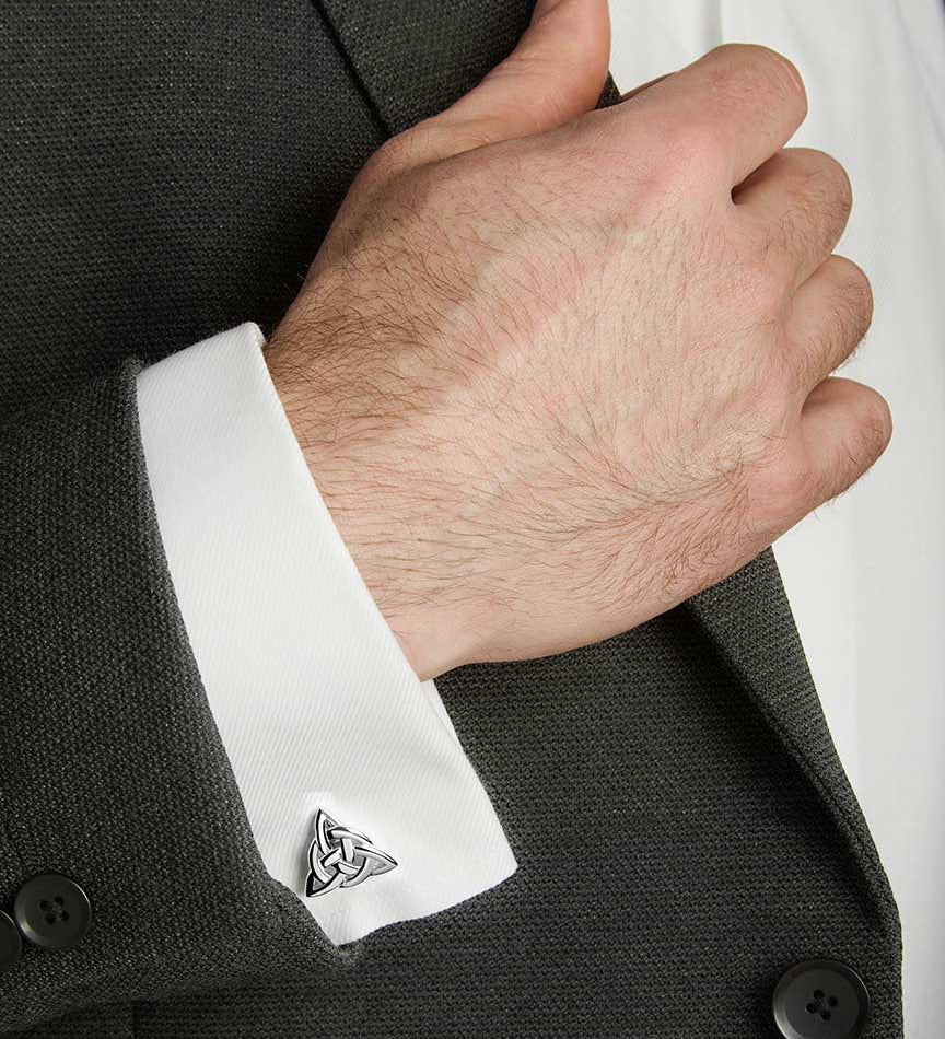 a model wearing silver Celtic Knot cufflinks from Solvar