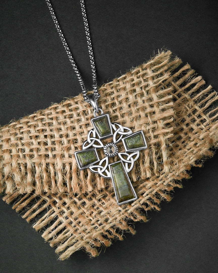 lifestyle image of green marble celtic cross necklace in silver