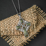 lifestyle image of green marble celtic cross necklace in silver