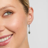 Celtic Knot drop earrings on a model
