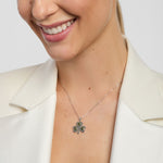 green marble large shamrock necklace on a model