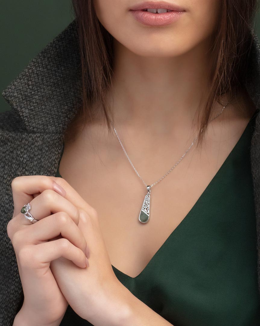 model wearing connemara marble trinity knot necklace s46646 from Solvar