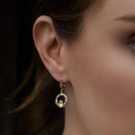14K Gold Flush Set Diamond Claddagh Earrings S34191 on a model 1