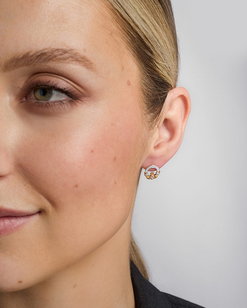 14K gold diamond claddagh earrings s33478 on a model 2