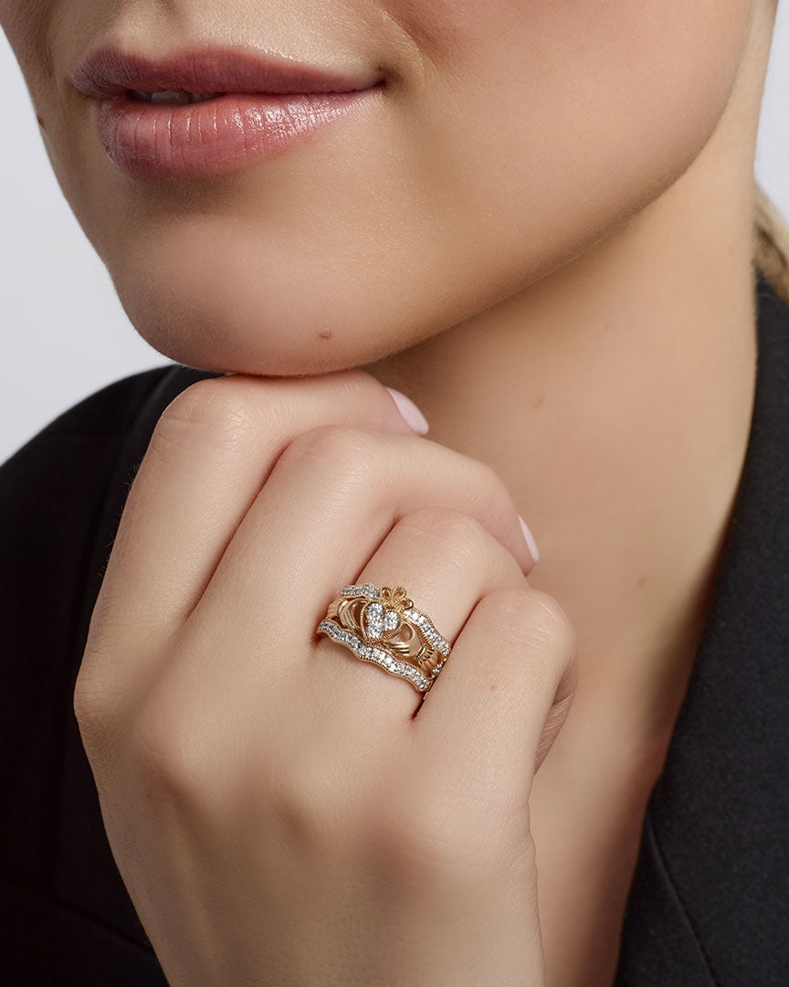 ladies 14k gold diamond wide claddagh ring s21023 from Solvar on a model