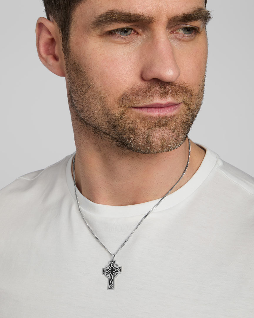 male model wearing double-sided silver Celtic Cross pendant from Solvar