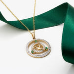 lifestyle image of emerald celtic knot necklace s46788