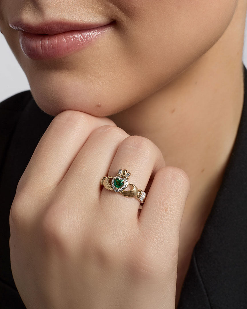ladies 14k gold diamond and emerald claddagh ring s21030 from Solvar on a model 2