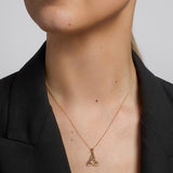 14k gold emerald trinity knot pendant s45589 on a model 2