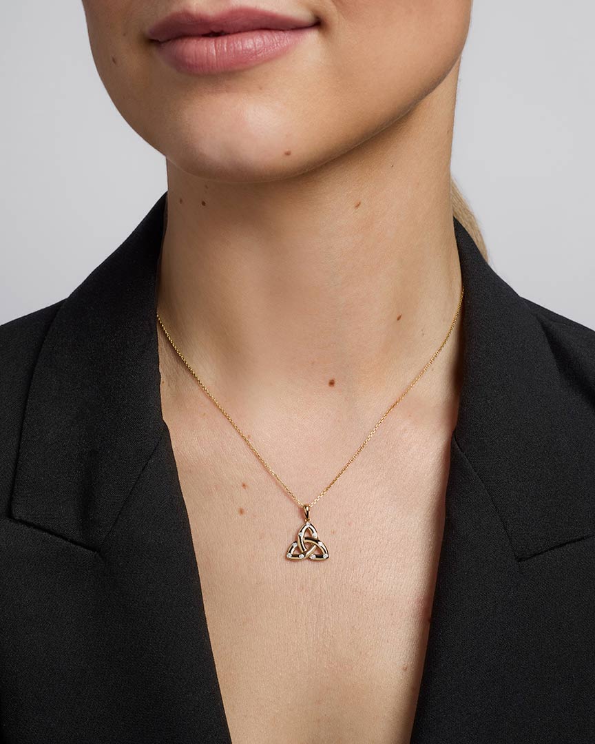 14K gold flush set diamond Trinity Knot Necklace S46969 on a model 1