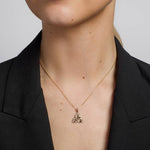 14K gold flush set diamond Trinity Knot Necklace S46969 on a model 1