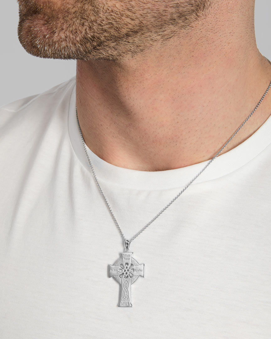 back side of four Apostles Celtic cross pendant on a male model