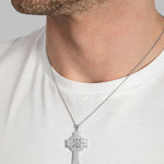 back side of four Apostles Celtic cross pendant on a male model