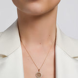 celtic round trinity knots necklace presented on a model