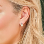 freshwater pearl Trinity Knot earrings on a model