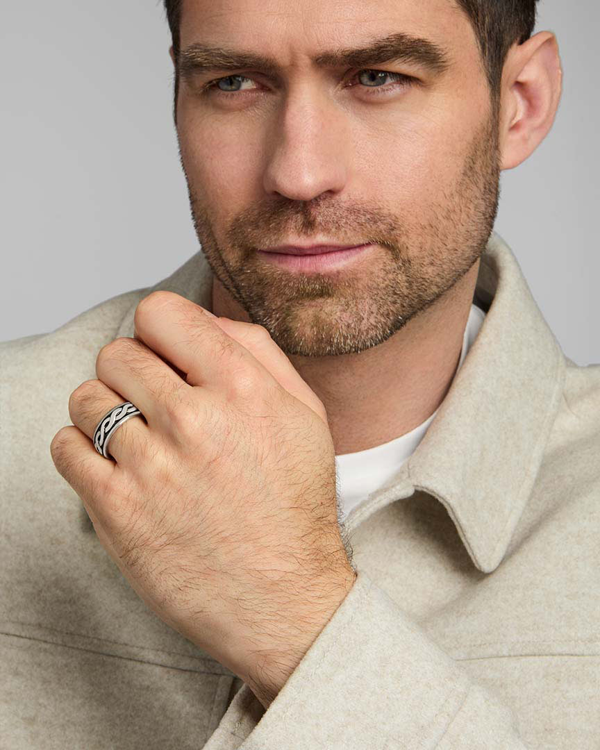 a male model wearing silver celtic knot ring from Solvar