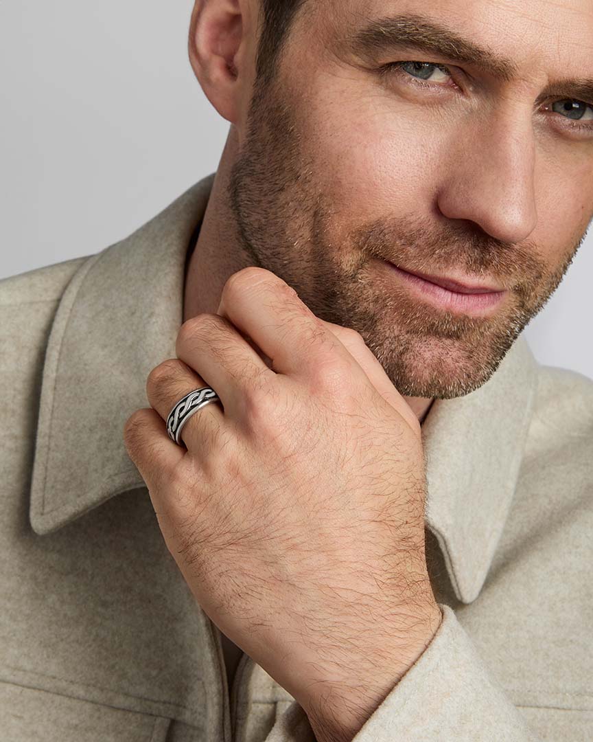 silver celtic knot band on a male model 2