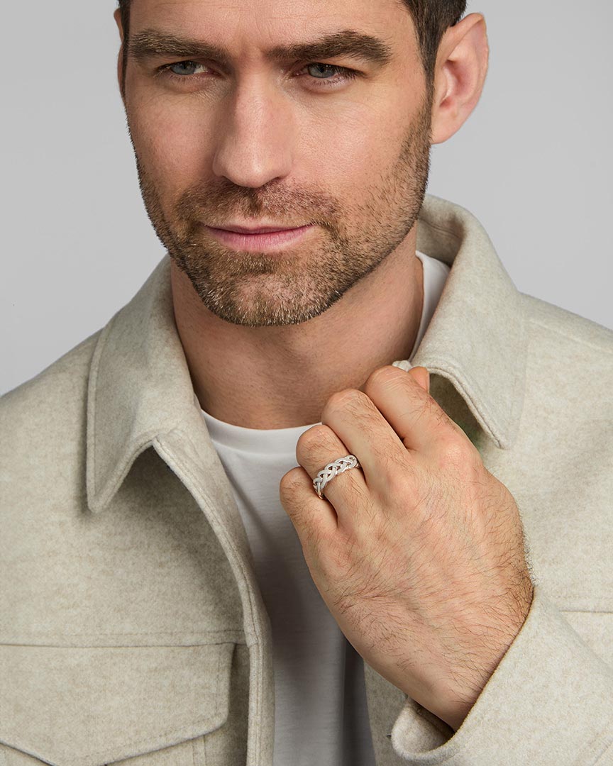 a male model wearing silver celtic knot ring from Solvar