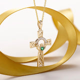 styled image of 14k gold diamond and emerald claddagh cross pendant s44515 from Solvar