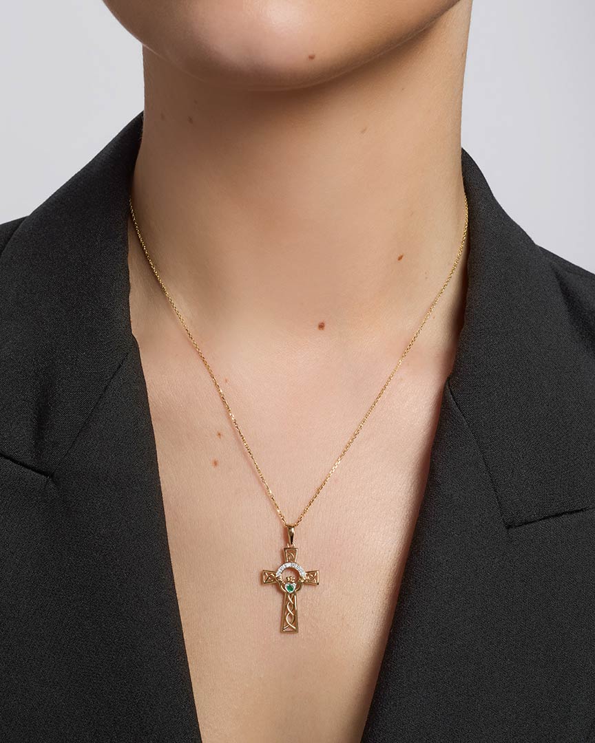 14k gold diamond and emerald claddagh cross pendant s44515 from Solvar on a model