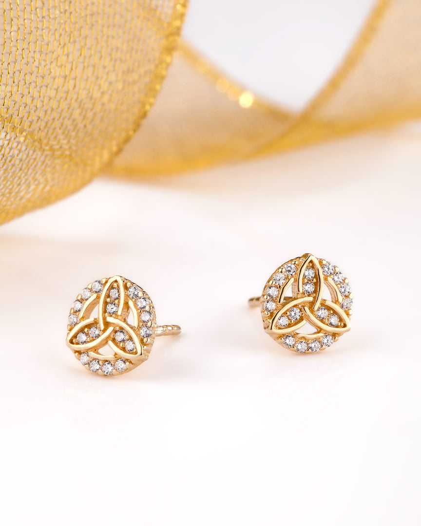 styled image of gold trinity knot stud earrings