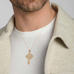 men's 14k gold hand-engraved heavy celtic cross on a model