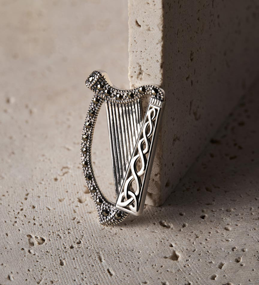 lifestyle image of  marcasite Irish Harp brooch in silver