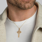14k gold large celtic cross necklace on a male model