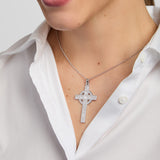model wearing large History of Ireland Cross pendant in silver