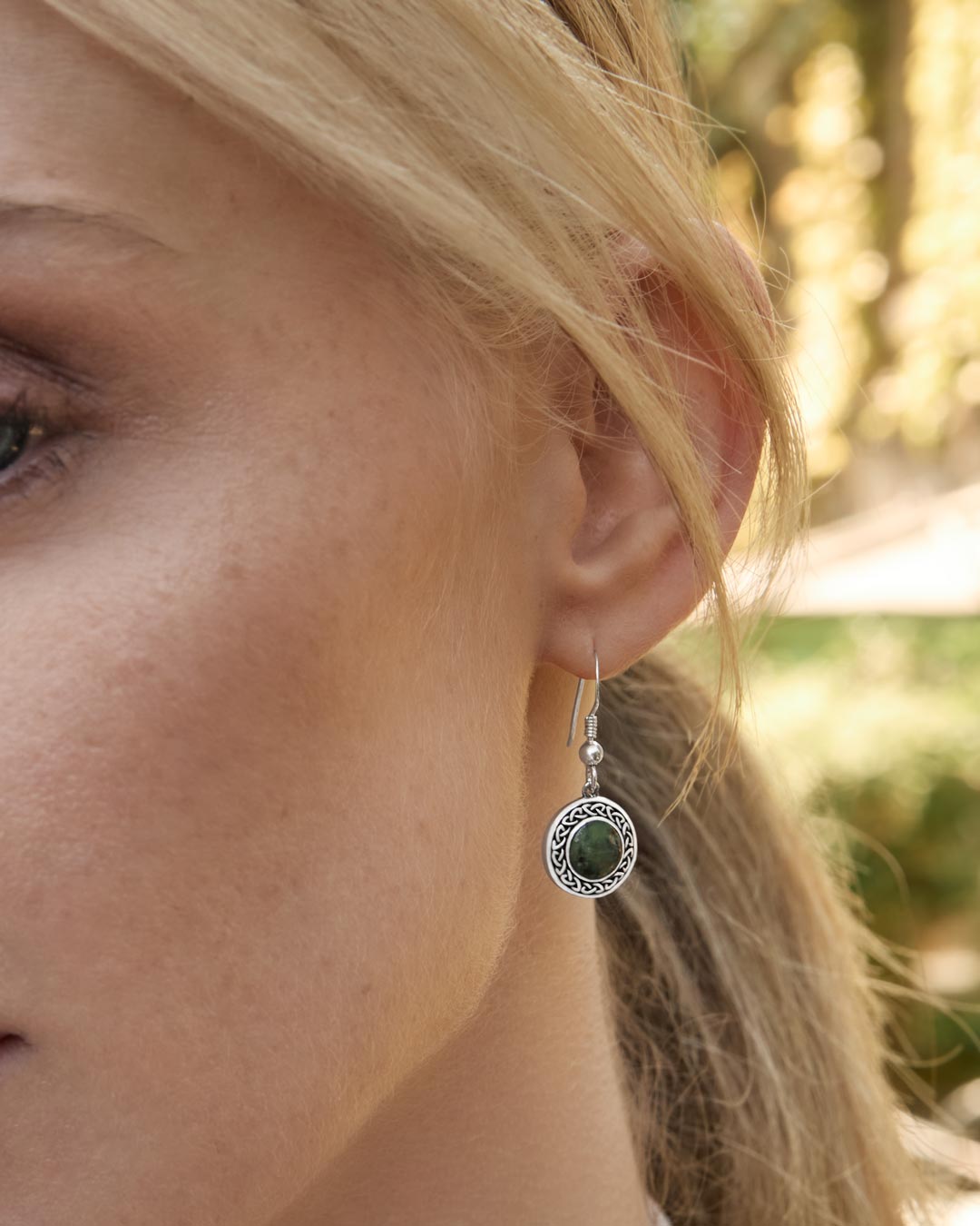 model wearing connemara marble celtic drop earrings from Solvar