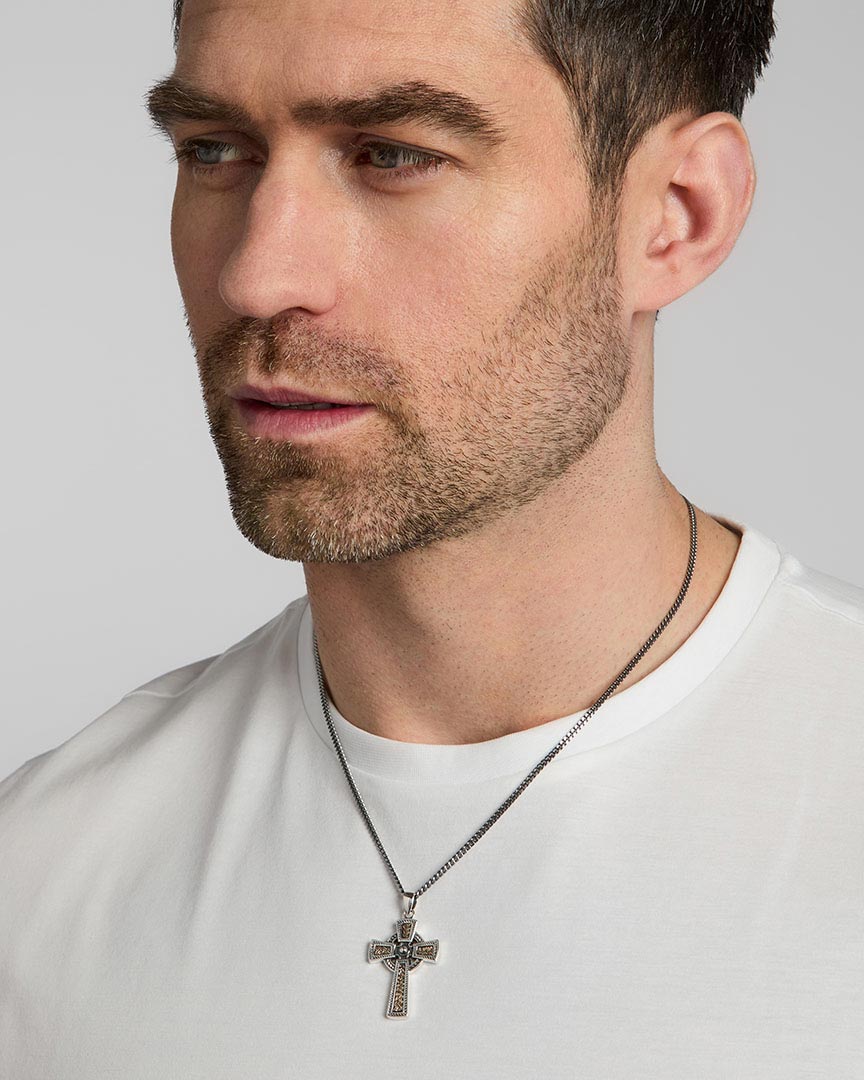 a male model wearing mixed metal Celtic Cross pendant from Solvar