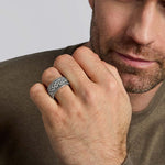 closeup image of mens heavy Celtic Knot ring on a model