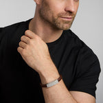 a male model wearing brown leather Celtic bracelet from Solvar
