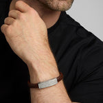 mens brown leather celtic bracelet on a model