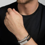 men's stainless steel Celtic black leather bracelets on a model from Solvar