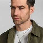 male model wearing oxidised silver large Celtic Knot pendant from Solvar