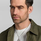 male model wearing oxidised silver large Celtic Knot pendant from Solvar