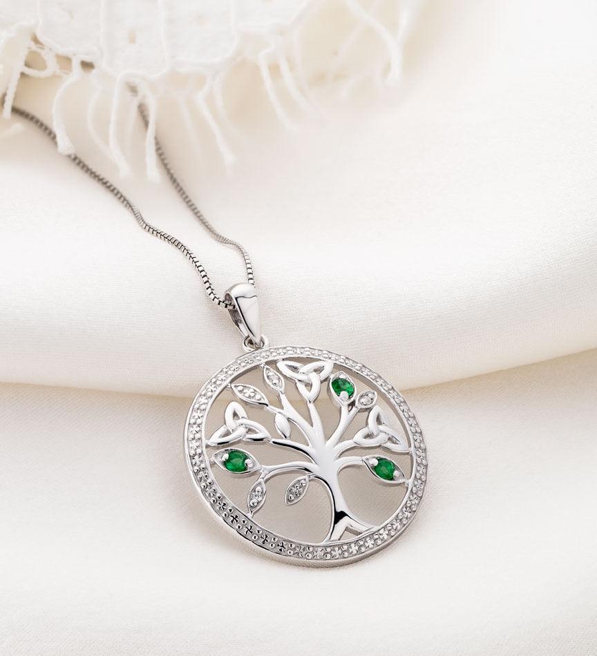 style image of silver Irish Tree of Life necklace on the light background