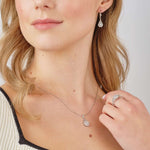 a model wearing Solvar cluster cz trinity knot necklace s46996