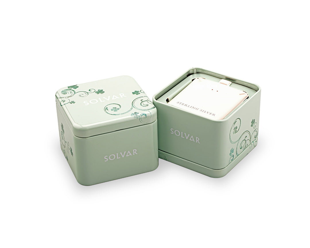 light green tin jewellery box with Solvar logo on it