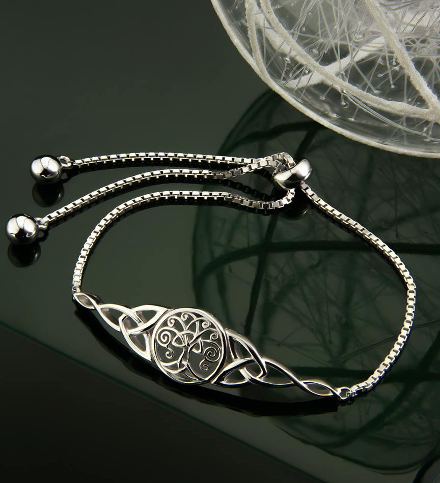 styled image of Celtic tree of life bracelet from Solvar on green background
