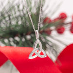 styled image of 14k white gold diamond trinity knot pendant s44415 from Solvar 1
