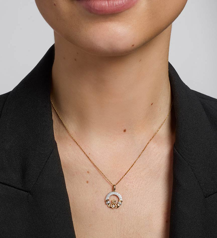 model wearing diamond irish claddagh necklace s45602 