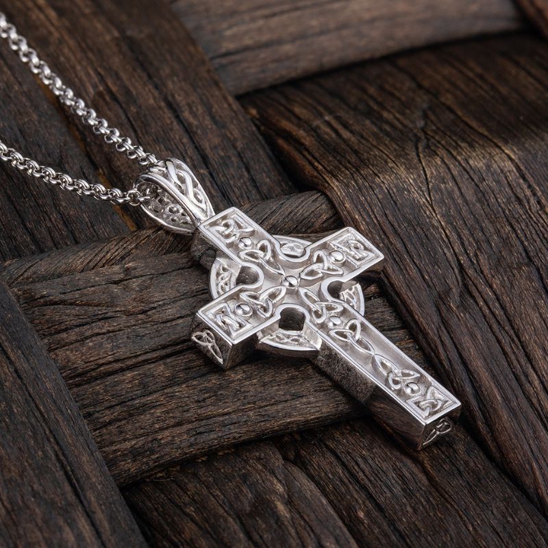 a styled image of silver celtic cross necklace