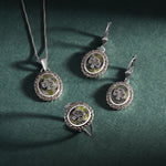 lifestyle image of matching connemara marble marcasite shamrock necklace, earrings, and ring