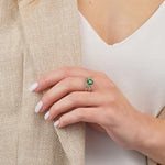 styled image of Solvar Sterling Silver Green Crystal Trinity Knot Ring S21141 on a model