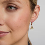 14K gold emerald trinity knot drop earrings s33500 on a model 1