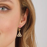 a model wearing Solvar flush set diamond trinity knot drop earrings s34224 