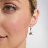 14k gold trinity knot drop earrings s3734 on a model 2